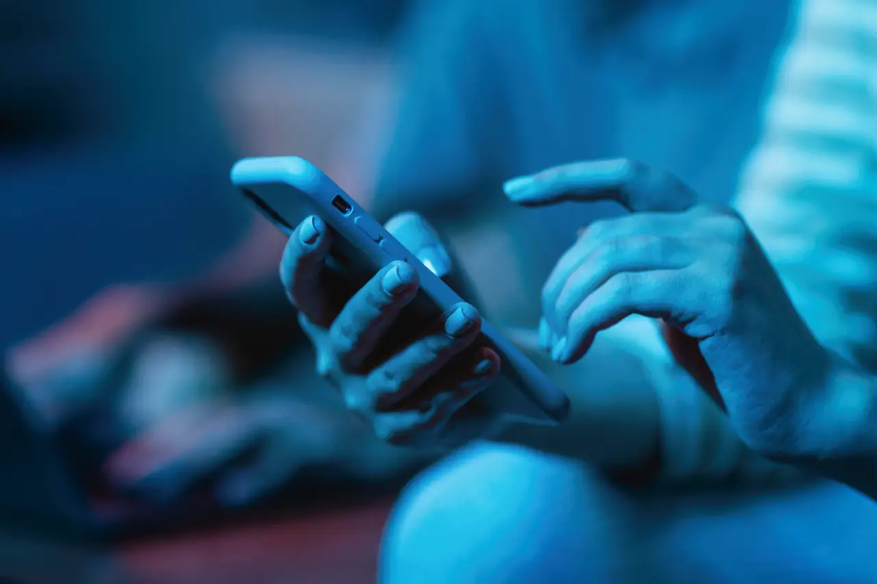woman-using-her-smartphone-while-home